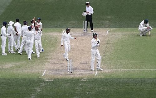 India celebrate their win in Adelaide