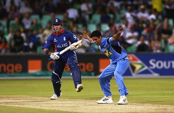 Ashish Nehra of India celebrates the wicket of Alec Stewart of England