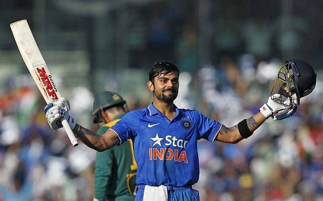 Virat Kohli celebrates after reaching his hundred in Chennai