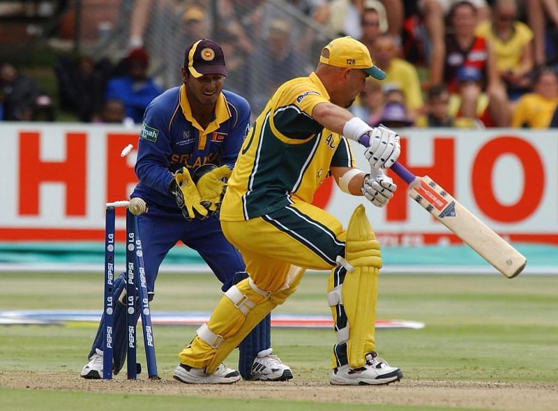 Australian batsman Darren Lehmann is bowled by Sri Lankan captain Sanath Jayasuriya for 36, as wicketkeeper Kumar Sangakkara looks on. (Picture: Getty Images)