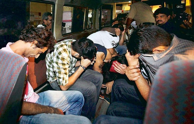 A group of people sitting in a train<p></p><p>Description automatically generated with low confidence
