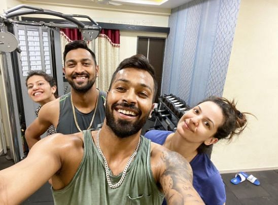 Hardik Pandya and his wife along with his brother Krunal Pandya and his wife Pankuri Pandya
