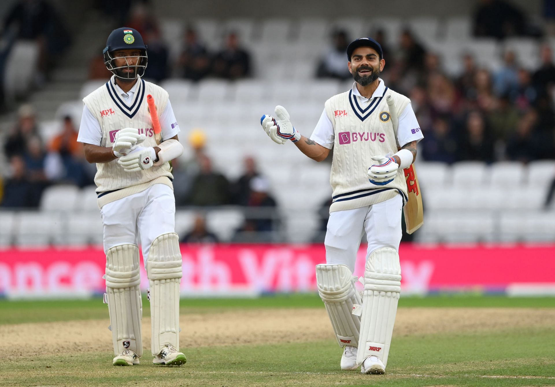 Virat Kohli and Cheteshwar Pujara have had some memorable partnerships together for Team India. (Image: Getty)