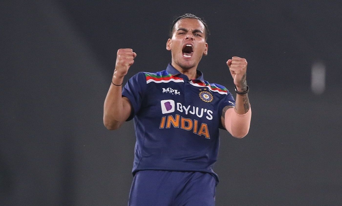 Leg-spinner Rahul Chahar celebrates wicket.