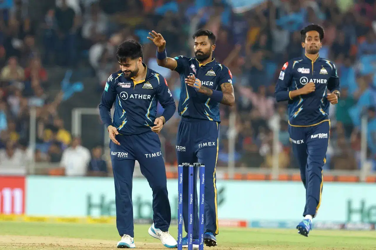 Rashid Khan celebrating a wicket with his teammates in IPL 2023 [IPLT20].