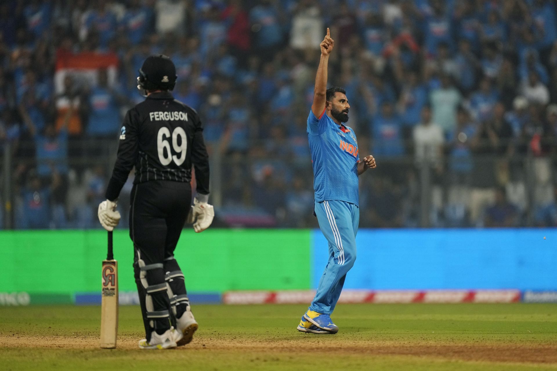 Mohammed Shami celebrates the wicket of Lockie Ferguson. (Pic: AP)