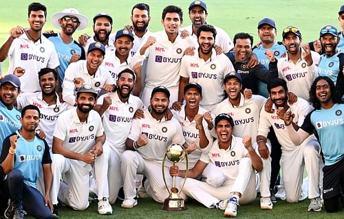 Indian players pose after their famous victory in Australia