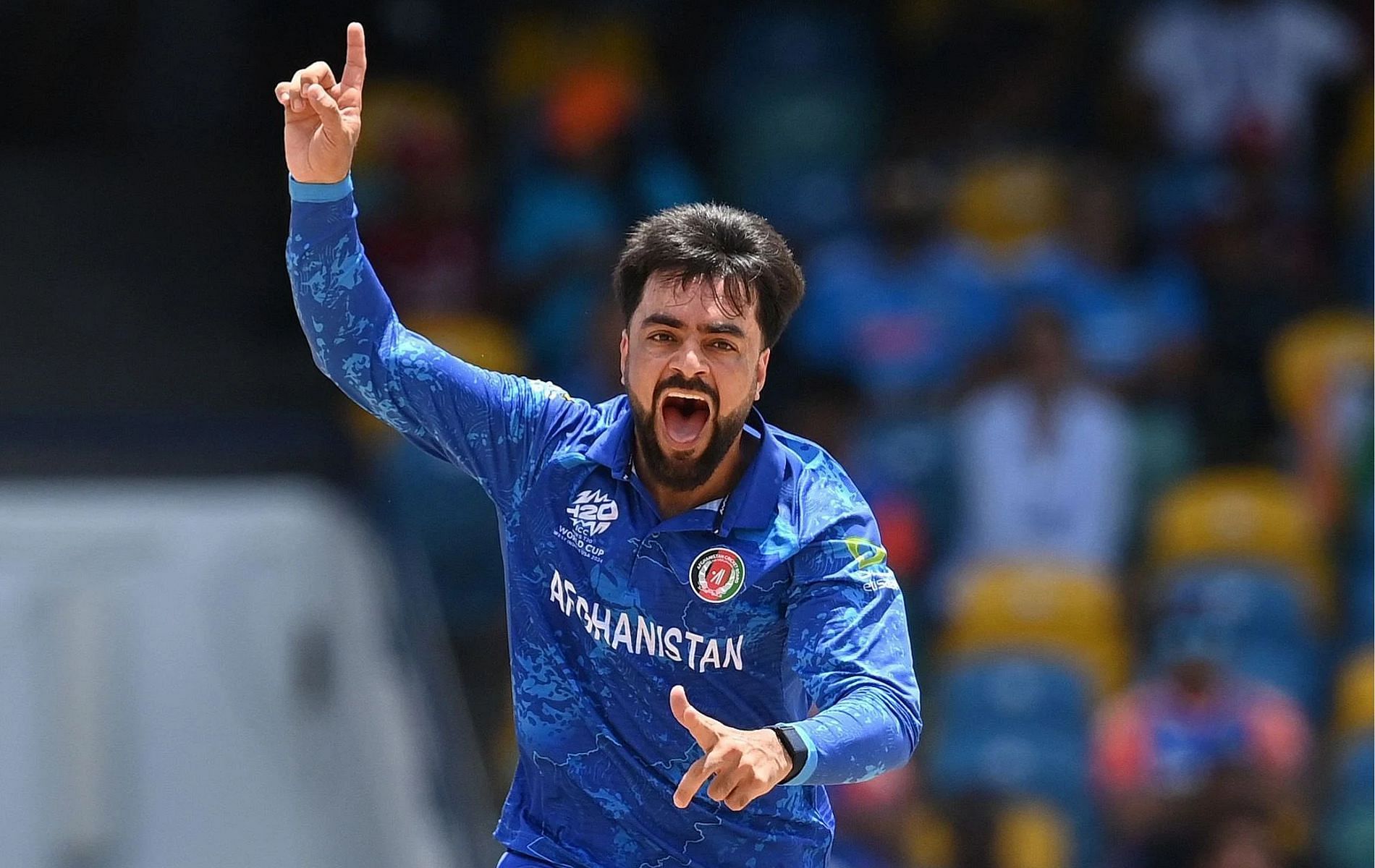 Rashid Khan celebrates the wicket of Shivam Dube. 