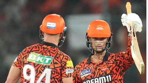 Abhishek Sharma raises his bat after scoring a fifty against MI (Source: IPL)