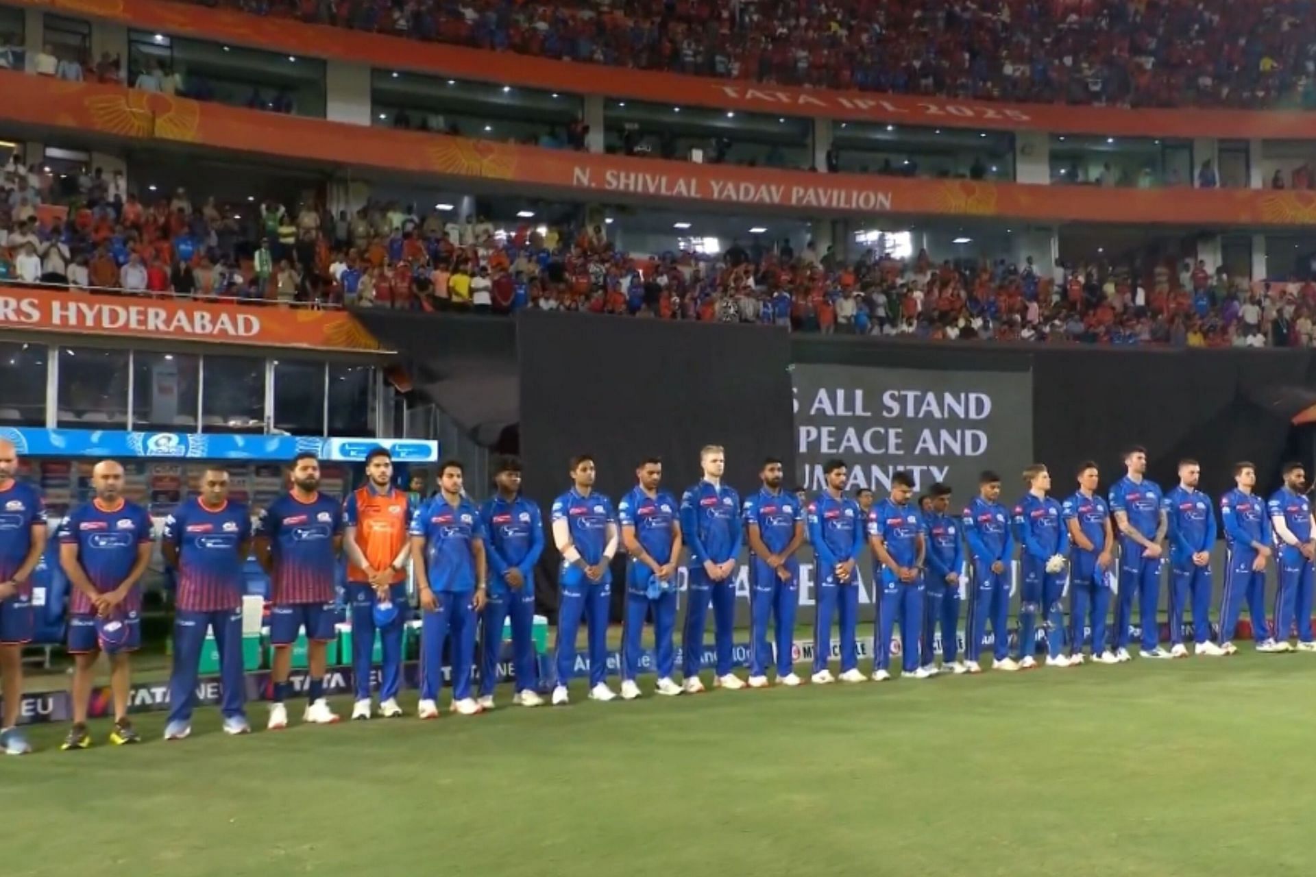 Players, match officials observe a minute