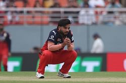 Why were RCB not penalized five runs after Suyash Sharma picked up the ball with his cap in IPL 2025 match vs RR?