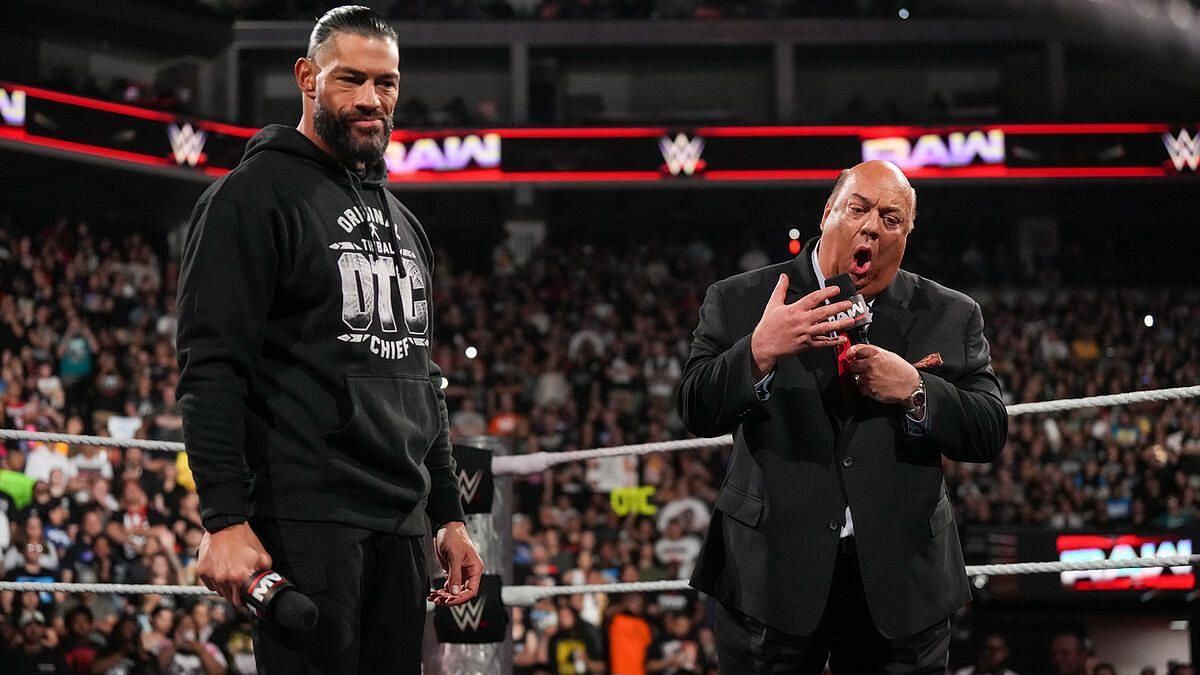 Roman Reigns and Paul Heyman (Image via WWE.com)