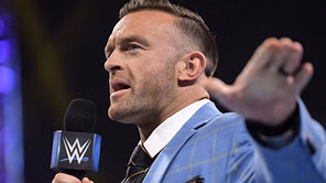 Nick Aldis ordered to strip WWE champion of her title and suspend her immediately; he reacts