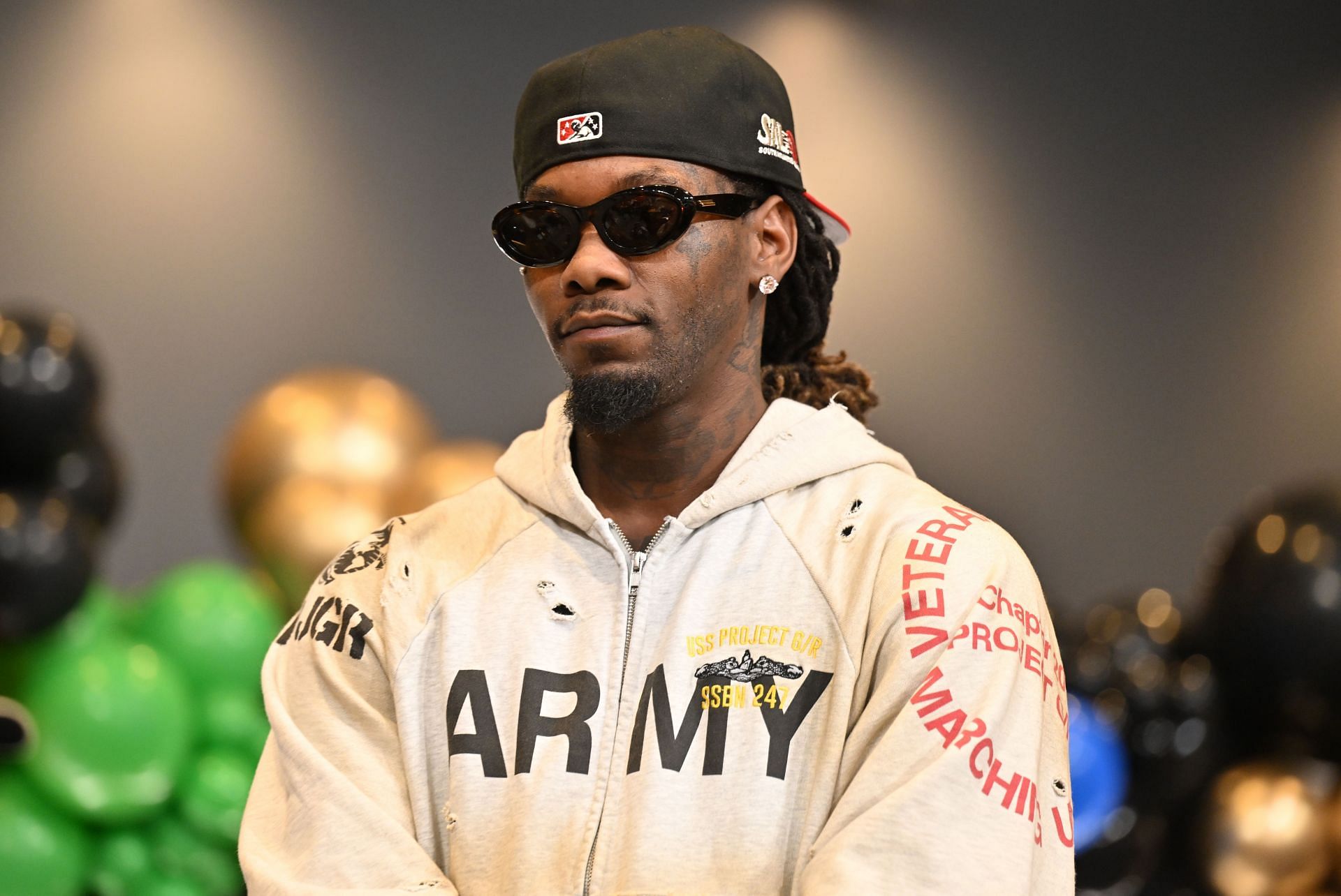 Offset at the Nouveau Bar &amp; Grill Winter Wonderland Experience Holiday Toy Drive. (Image via Getty)