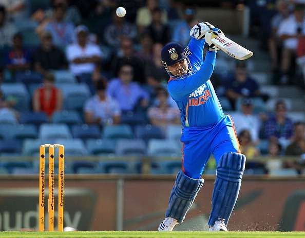 PERTH, AUSTRALIA - FEBRUARY 08: Virender Sehwag of India drives for four during the One Day International match between India and Sri Lanka at WACA on February 8, 2012 in Perth, Australia. (Photo by Hamish Blair/Getty Images)